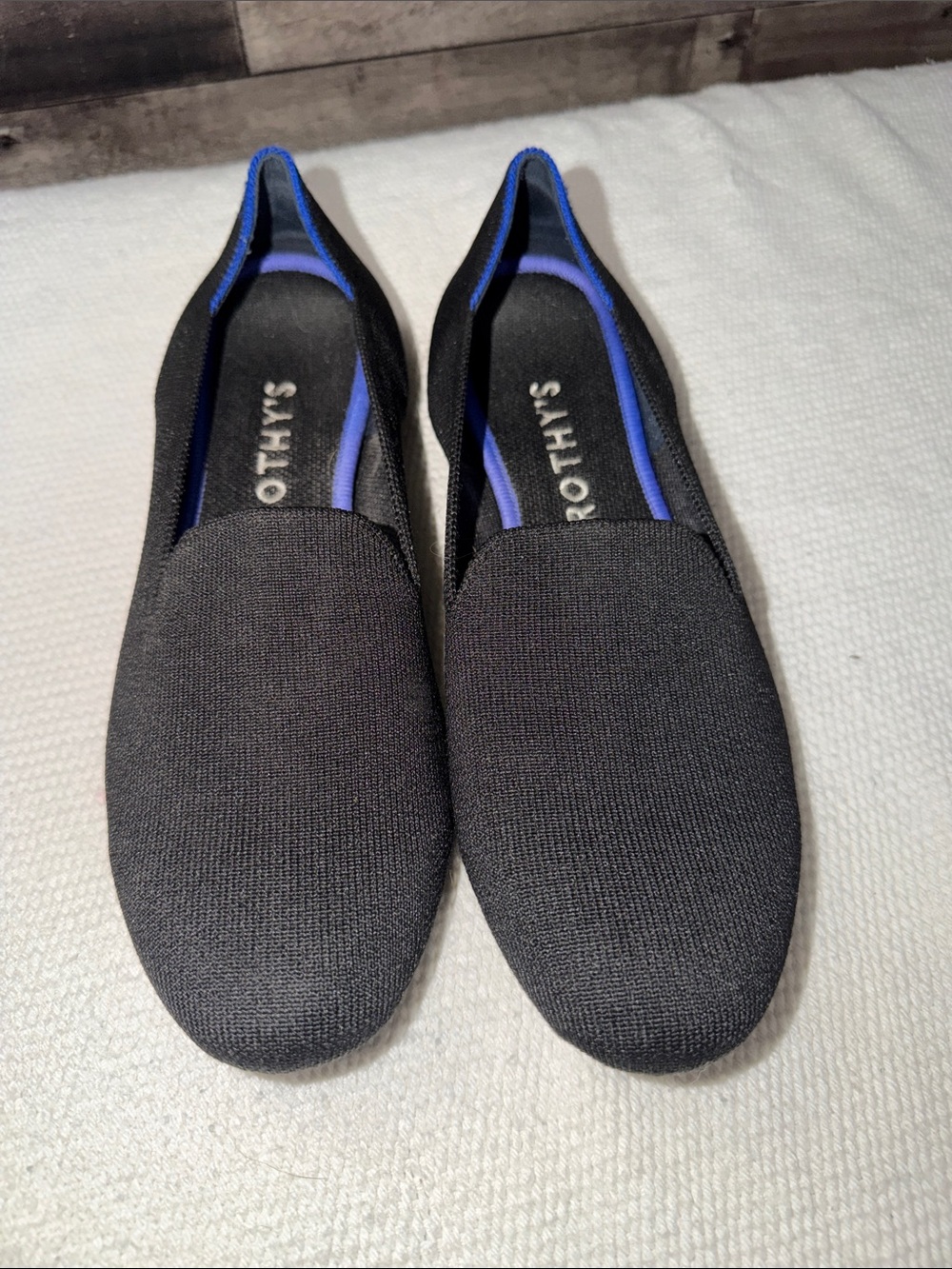 Rothy’s  Black Slip-On Loafers with Blue Trim